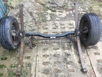 фото thumb №1, Вісь балка підвішування ресори зад vw caddy iii 2k0500051ab 2k0511151e