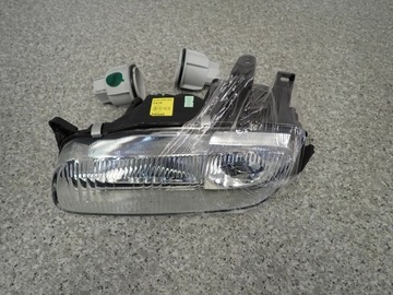 фото thumb №1, Mazda 323 ba f 94-98 лампа передня ліва фара