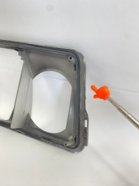 фото thumb №12, Рамка плафон лампы фара перед левая hella mercedes w124 12957900 повреждённый