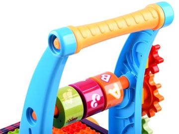 Drewniany pchacz edukacyjny wózek cymbałki klocki ECOTOYS
