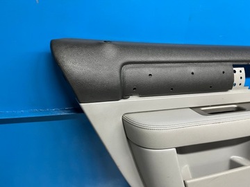 фото thumb №7, Navigator ii 03- боковина оббивка двері лівий зад