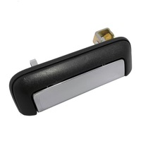 фото thumb №1, Ручка зовнішня кришки задньої зад багажника mitsubishi l200 2002 2003 2004