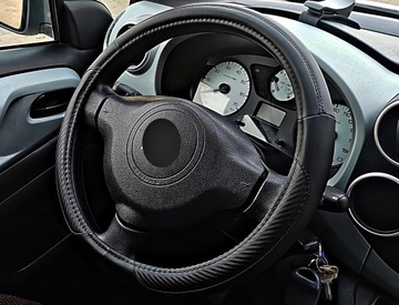 Pokrowiec na kierownice Opel Astra G H J K Corsa Meriva Mokka skóra karbon