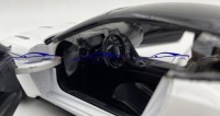 Модель Aston Martin DB11 белого цвета 1:24 Motormax 79345