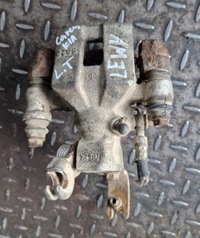 фото thumb №1, Супорт гальмівний лівий задня kia carens ii 2.0crdi