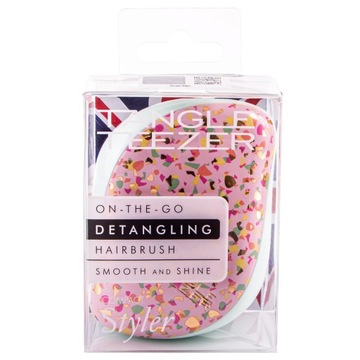 Расческа Tangle Teezer для распутывания волос.