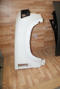 фото thumb №1, Оригинальная рамка лампы передней правая defender ii