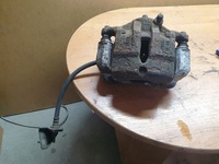 фото thumb №1, Суппорт тормозной левый перед hyundai ix35 1.7