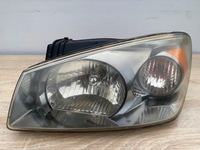 фото thumb №1, Лампа фара лівий перед kia cerato i + вкладиш - 921012f0