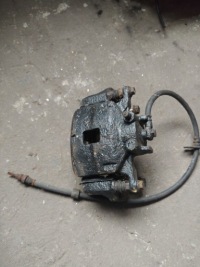 фото thumb №1, L200 2,5 did 06-12 суппорт тормозной левый передний