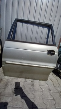 фото thumb №1, Двері лівий зад kia joice 01r