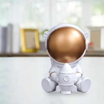 Żywiczne figurki astronautów Hotel Sit Gold