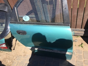 Двері праві зад daewoo lanos 5d 43u зелений фото №1