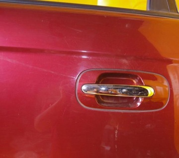 Hyundai trajet 2.0 16v ручка зад лівий зовнішня фото №1