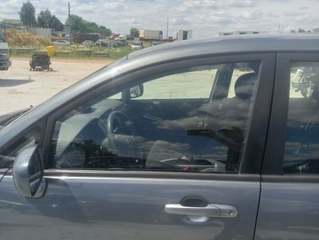 Suzuki liana скло бокова передня ліва фото №1