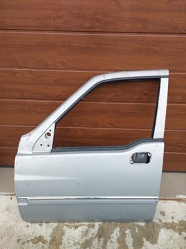Двері лівий перед передні daewoo ssangyong musso фото №1