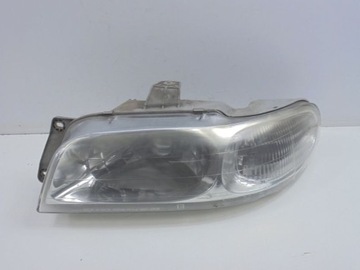 Daewoo nubira i j100 фара лівий h4 0301-000711 фото №1