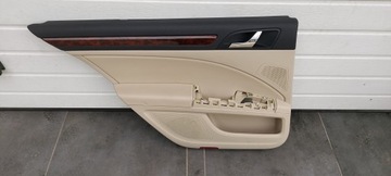 Боковина оббивка двері лівий зад skoda superb ii фото №1