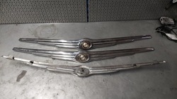 Voyager town country 08-10r эмблема капота перед фото №1