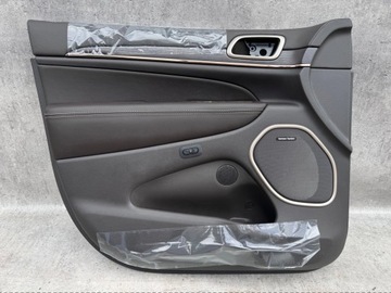 Оббивка двері ліва перед jeep grand cherokee wk2 фото №1