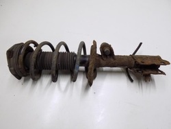 Nissan qashqai j10 1.5 амортизатор левый перед фото №1