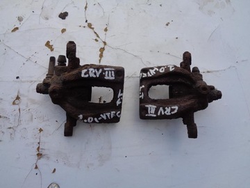 Супорт лівий зад honda crv iii 3 2.0 i-vtec фото №1