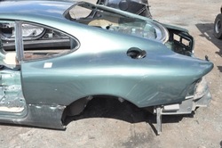 Aston martin db7 чверть крило лівий зад задній фото №1