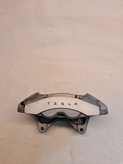 Суппорт тормозной левый перед tesla 3 1044621-00-e фото №1