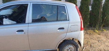 Daihatsu cuore 03- двері зад ліві s28 фото №1