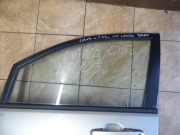 Suzuki liana 1.6b 05' стекло левый перед фото №1