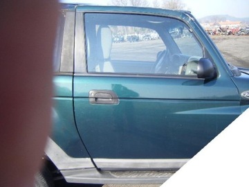 Ssangyong daewoo korando 96-04 двері праві фото №1
