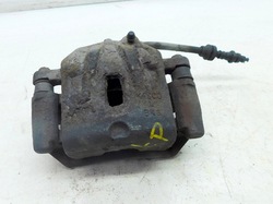 Kia carens ii 2.0 05r суппорт тормозной левый перед фото №1