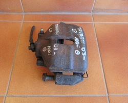 Vw touran 03- 1.9 tdi супорт гальмівний лівий перед фото №1