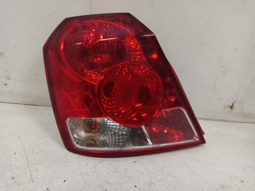 Chevrolet aveo ii hb 03-08 лампа лівий зад фото №1