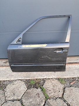 Обшивка двері лівих mercedes w124 1247220109 нове оригінал фото №1