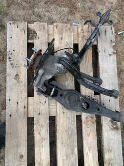 Kia sorento iv подвешивание зад балка рычаг поворотный кулак левая фото №1