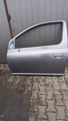 Двері ліві перед toyota yaris 04r hb 3d фото №1