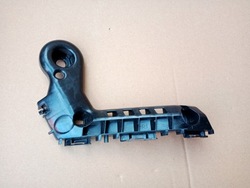 Toyota corolla e21 праві ковзун бампера перед фото №1