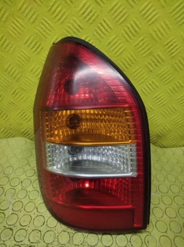 Opel zafira a лампа левый зад фото №1