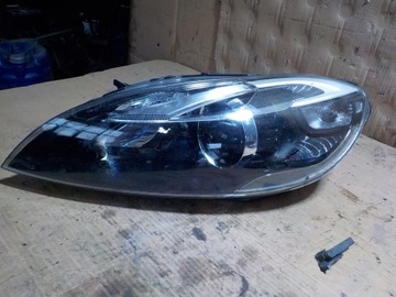 Volvo v40 лампа левый перед 31420007 фото №1