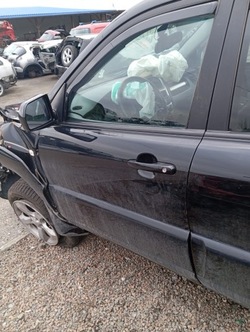 Kia sportage ii рестайлінг двері ліві перед передні голий 1k фото №1