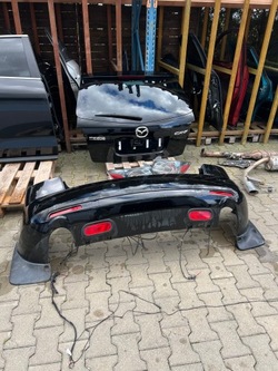 Mazda cx-7 бампер кришка багажника рік 2009 фото №1