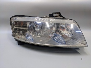Fiat stilo лампа фара перед правий 517127070 фото №1