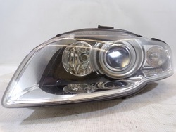 Лампа ліва передня перед bi ксенон audi a4 b7 фото №1