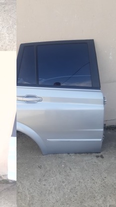 Двері праві зад ssangyong kyron 05-07r фото №1