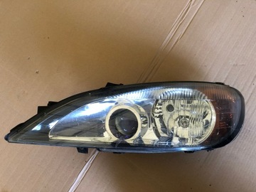 Ліва лампа лівий фара nissan primera p11 99-02 89005897 фото №1