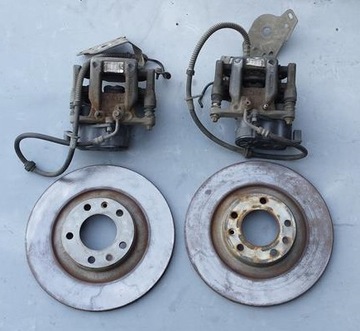 Затискачі диски гальмівні зад peugeot citroen 9819060880 9819060980 фото №1