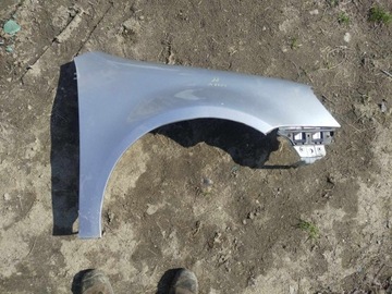 Крило правий перед vw golf v la7w 03- x фото №1