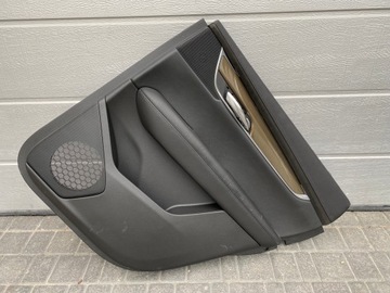 Оббивка двері права cadillac escalade новий модель фото №1