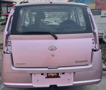Бампер зад задний daihatsu cuore фото №1